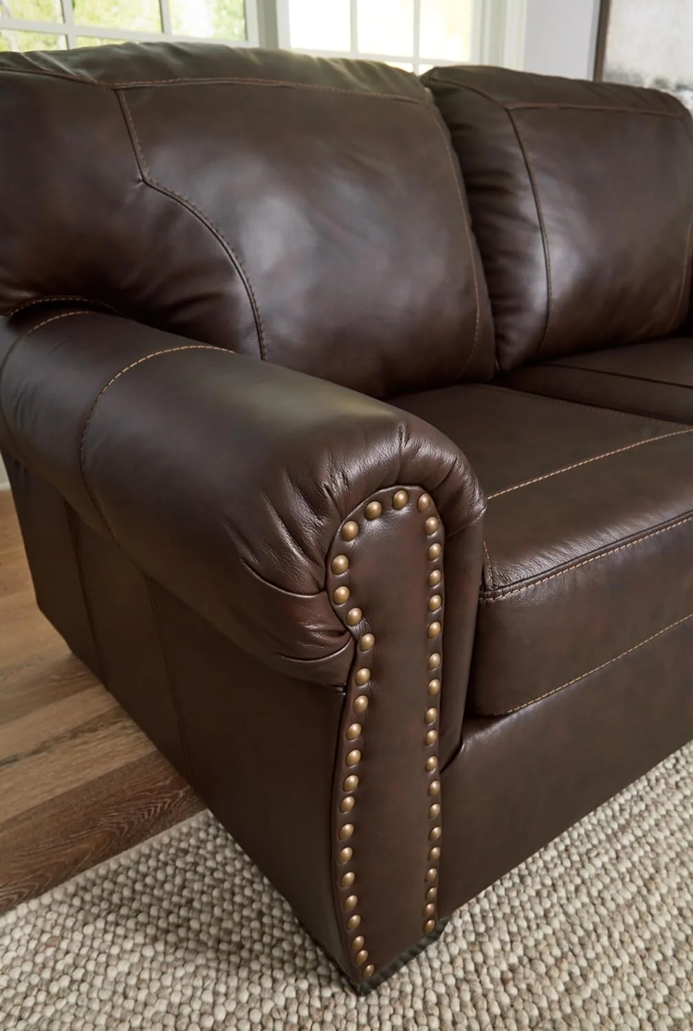 Signature Design by Ashley Colleton Classic Leather Match Sofa with Nailheads, Dark Brown - Retail $1057 - Image 7