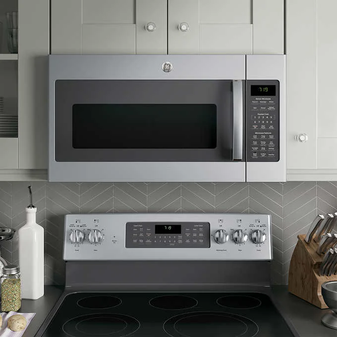 NEW W/ DAMAGE - GE 1.9 cu. ft. Over-the-Range Sensor Microwave Oven with Easy Clean Interior - Retail $439 - Image 3