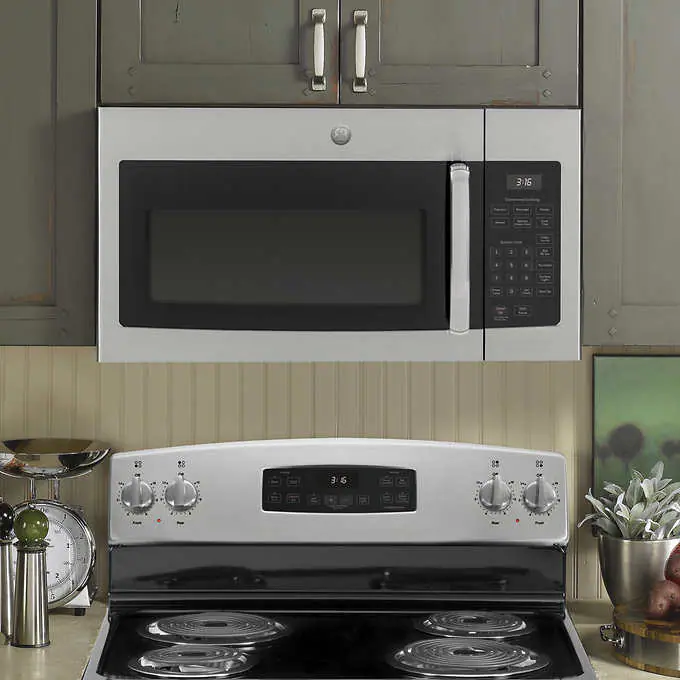 NEW - GE 1.6 cu. ft. Over-the-Range Microwave Oven with Cooktop Lighting and 300-CFM Exhaust Fan JVM3160RFSS - Retail $359 - Image 4