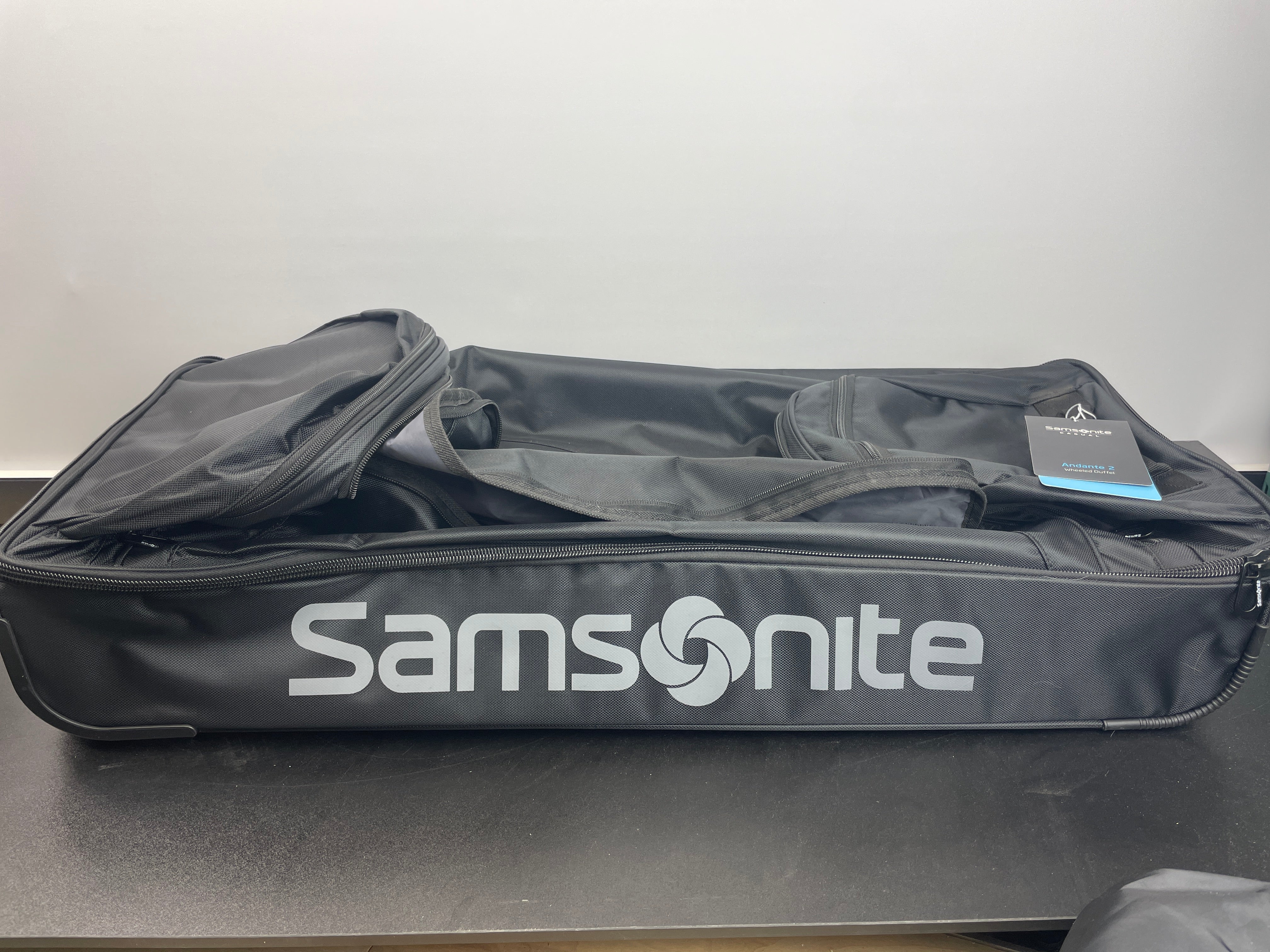 NEW - Samsonite Andante 2 Wheeled Rolling Duffel Bag, All Black, 32-Inch - Retail $105 - Image 5