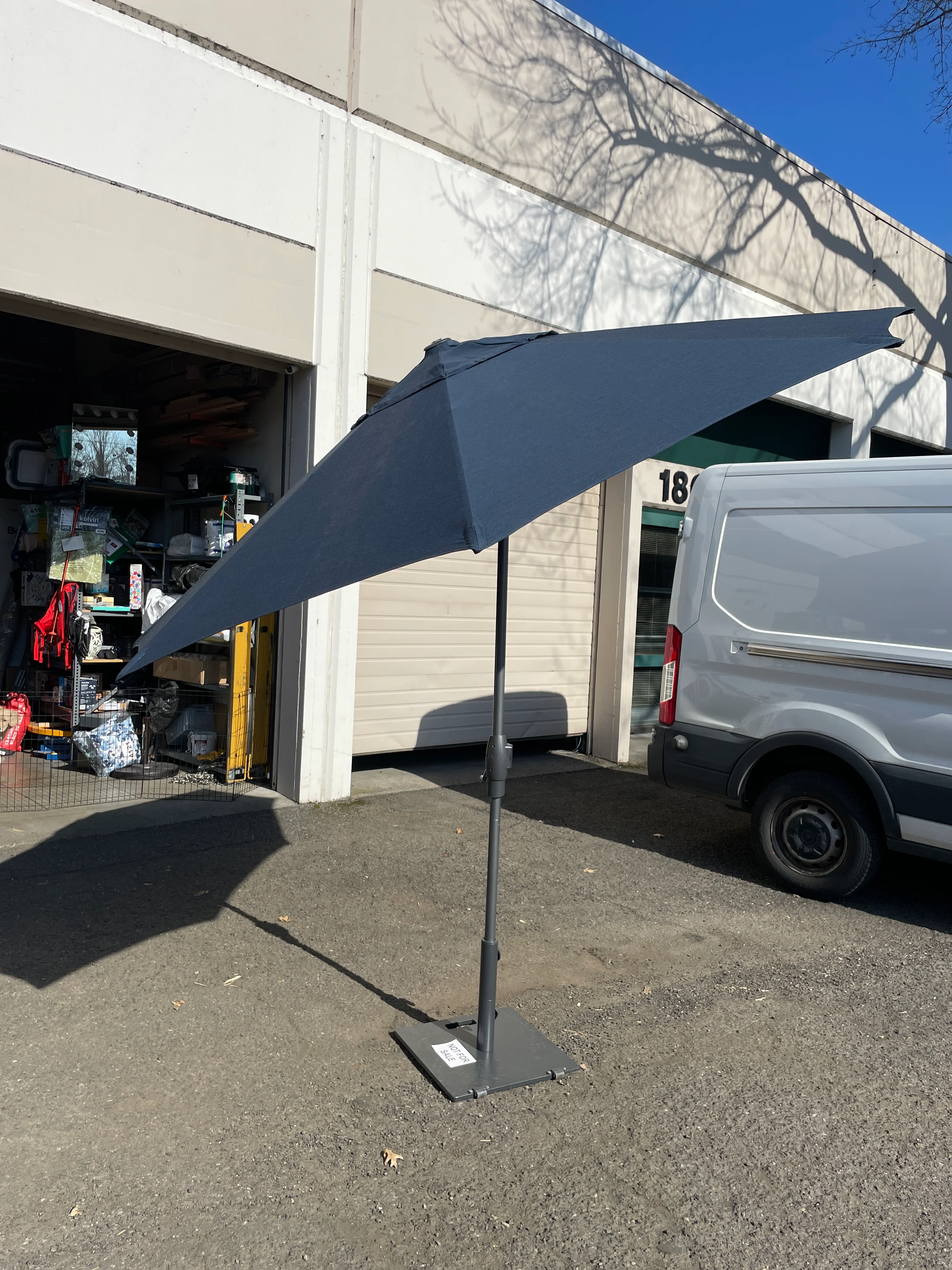 Sunvilla 10' Navy Blue Round Solar LED Market Umbrella